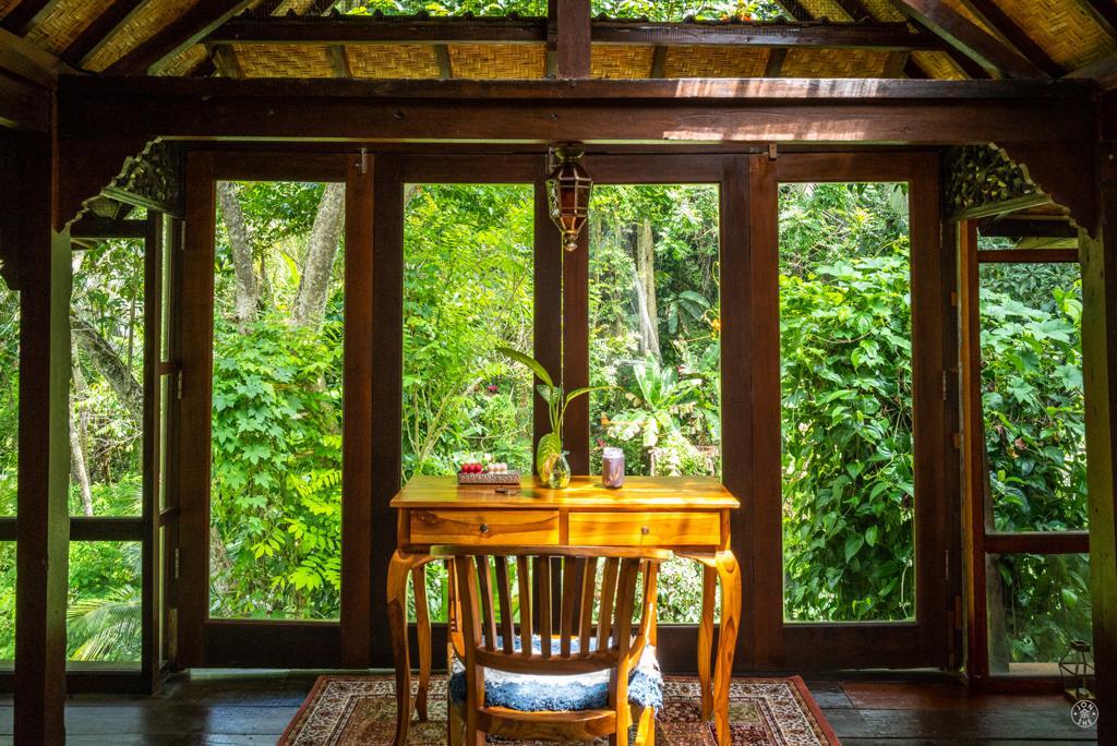 Rustic Airbnb accommodation in Ubud Jungle, Bali, with yoga patio and river view