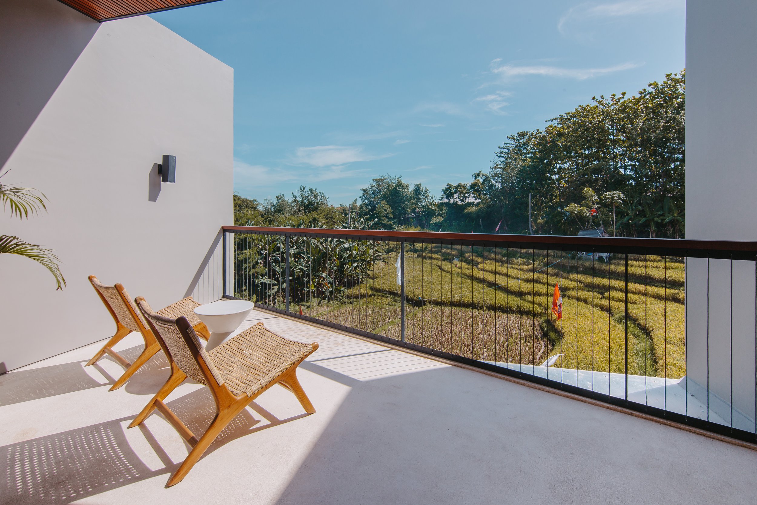 Secluded Studio Apartment in Canggu with Rice Field View Balcony and Modern Amenities